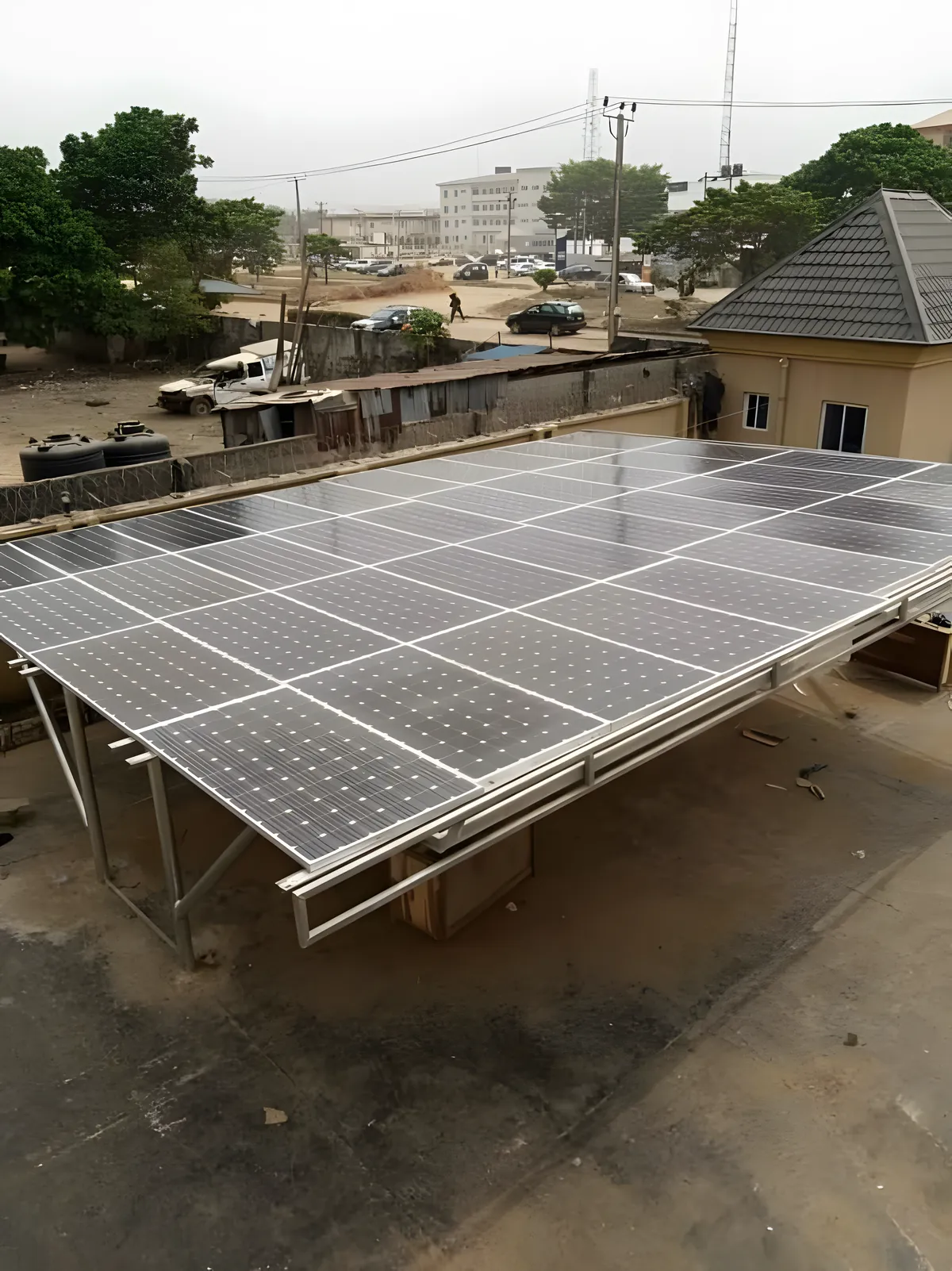 Ground-mounted solar array on a Benin City rooftop