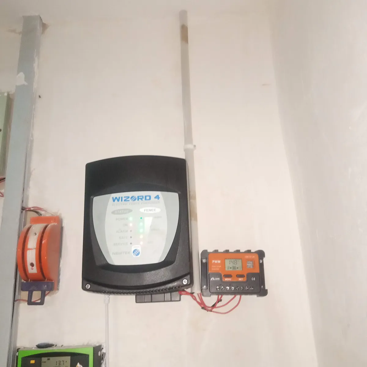 Charge controller and surge protection on a wall
